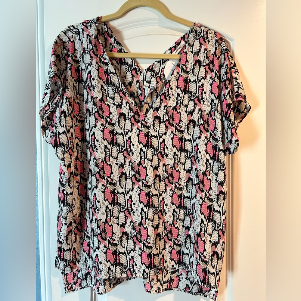 Snakeskin print blouse.